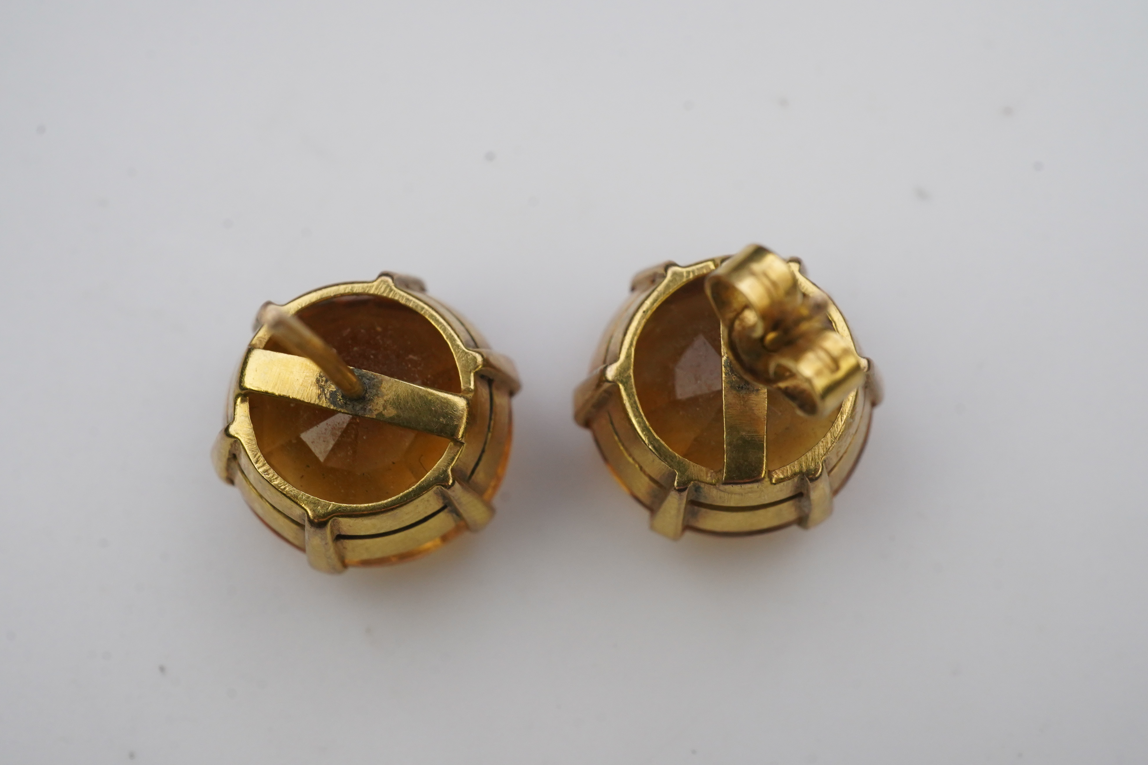 A pair of citrine ear studs